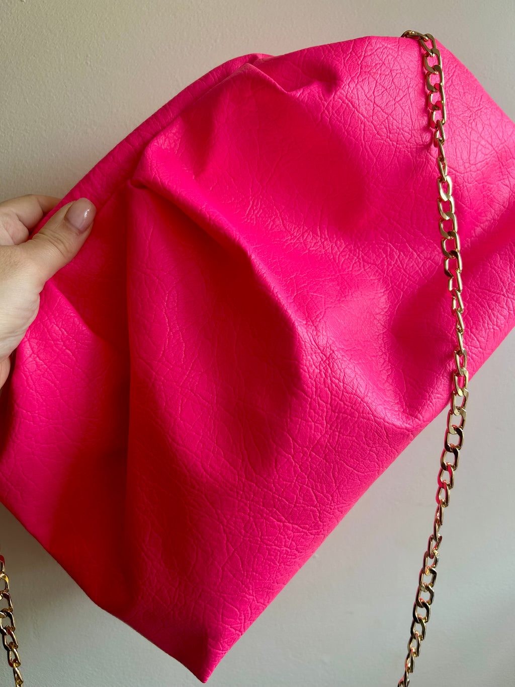 Neon pink dumpling bag