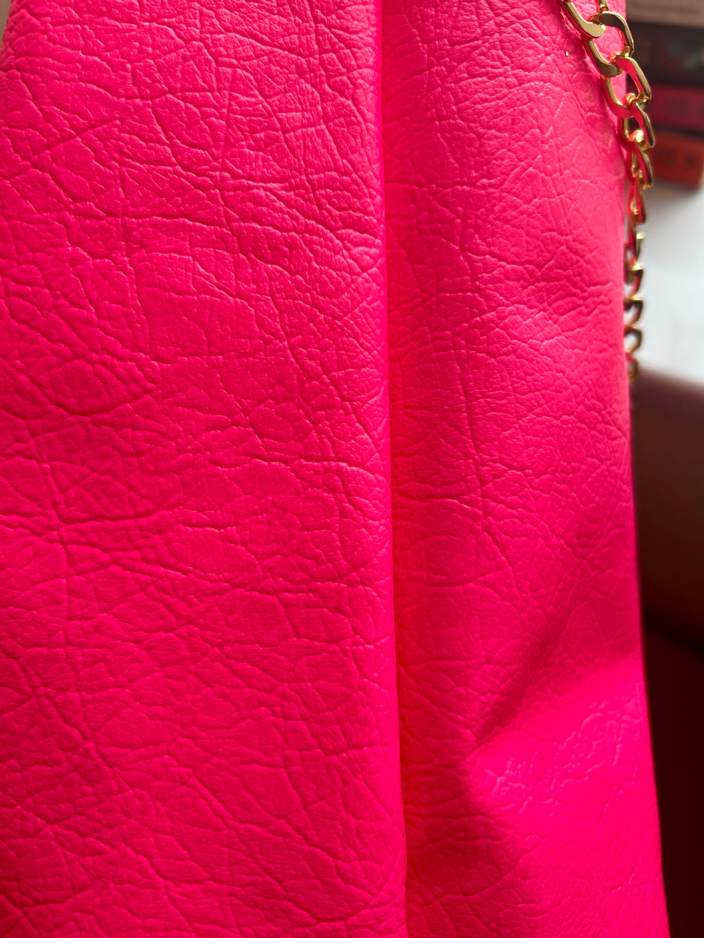 Neon pink dumpling bag