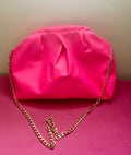 Neon pink dumpling bag