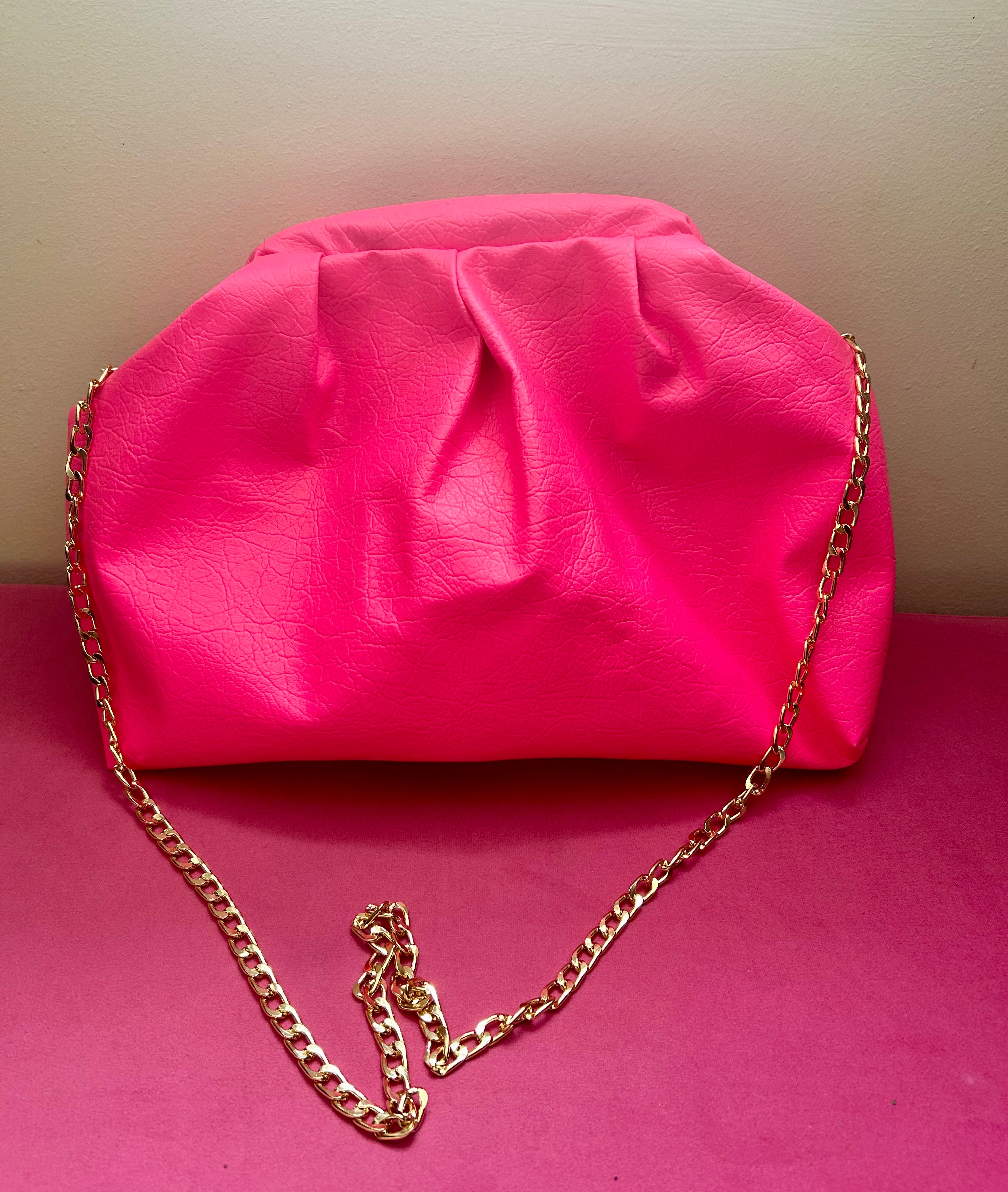 Neon pink dumpling bag