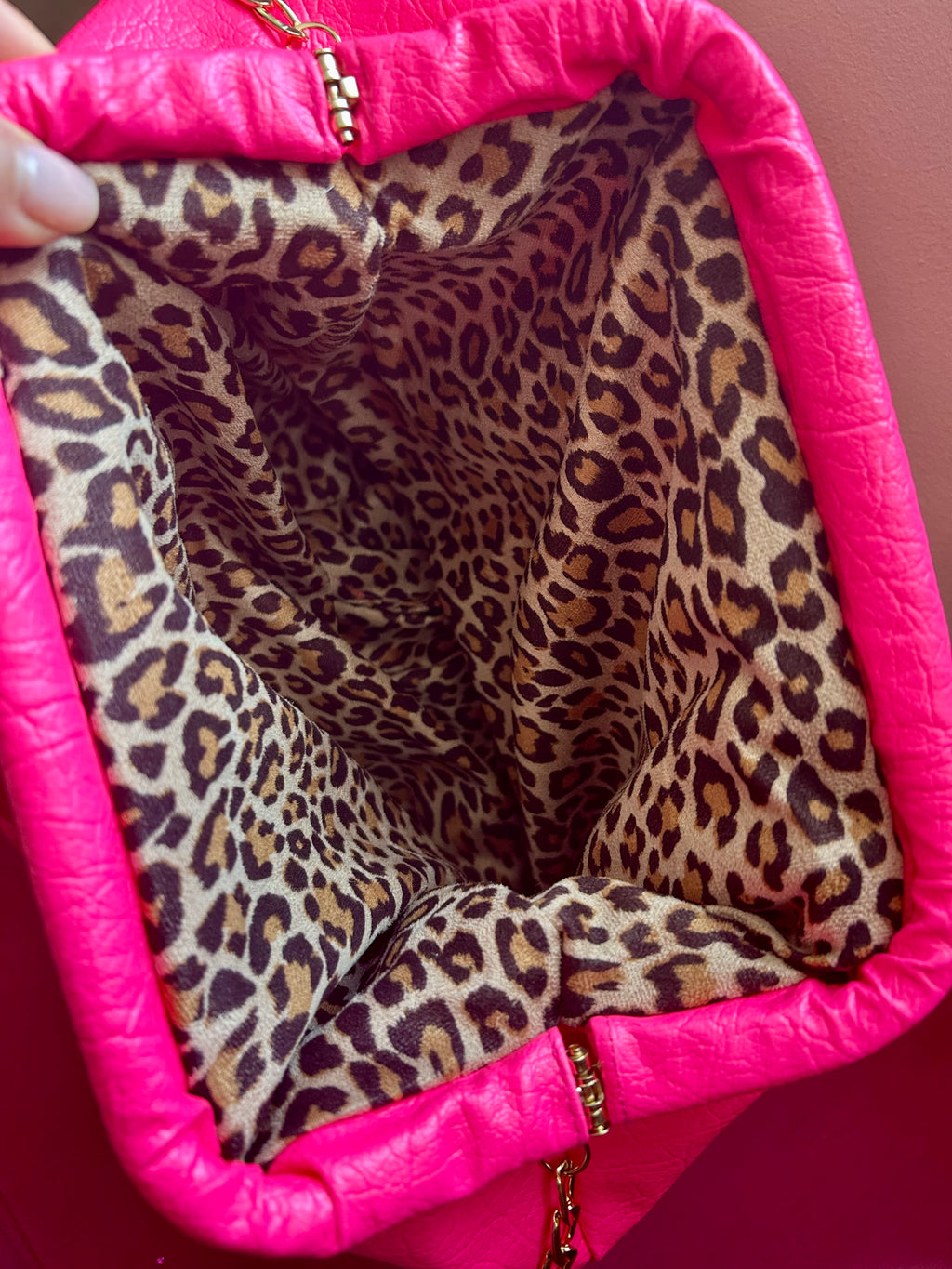 Neon pink dumpling bag