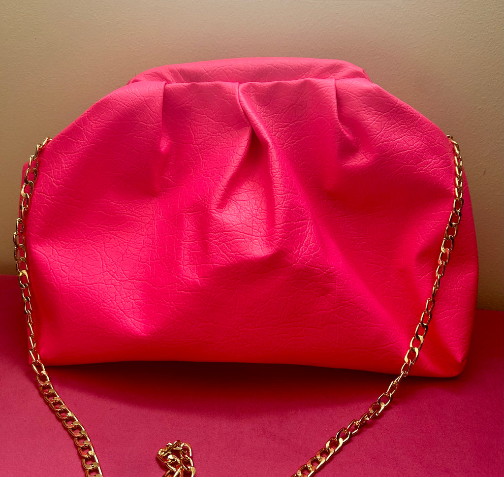 Neon pink dumpling bag