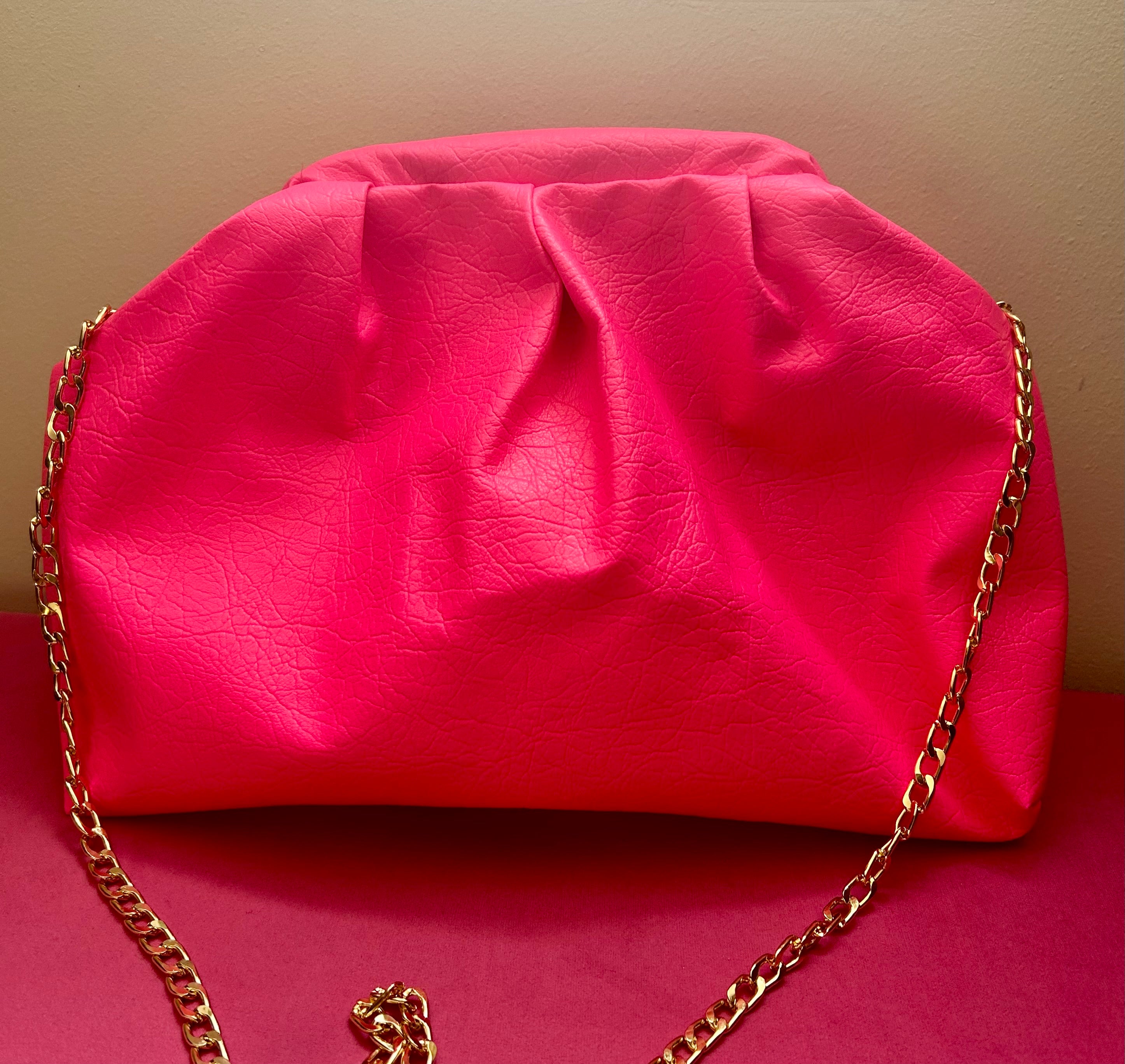Neon pink dumpling bag