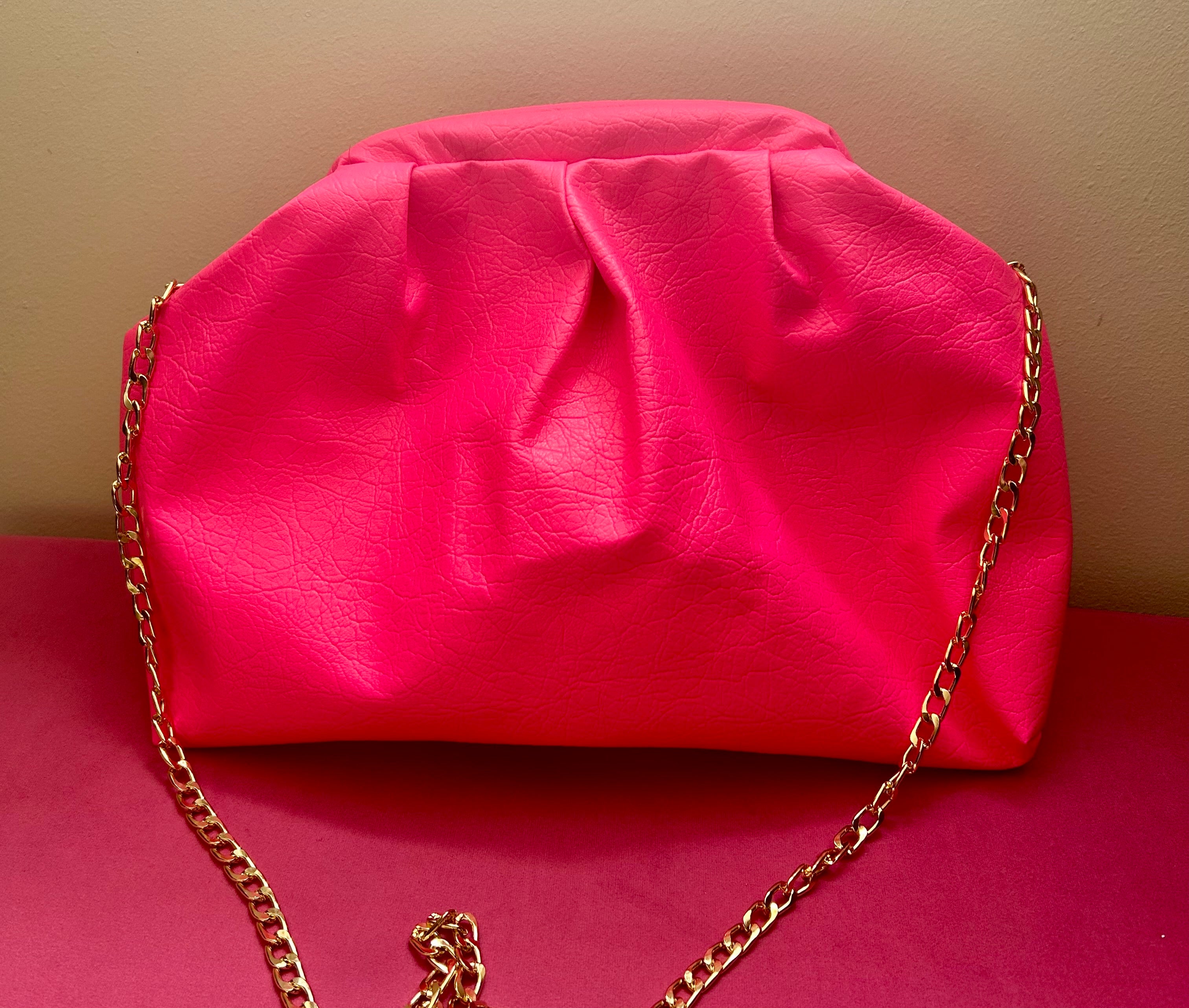 Neon pink dumpling bag