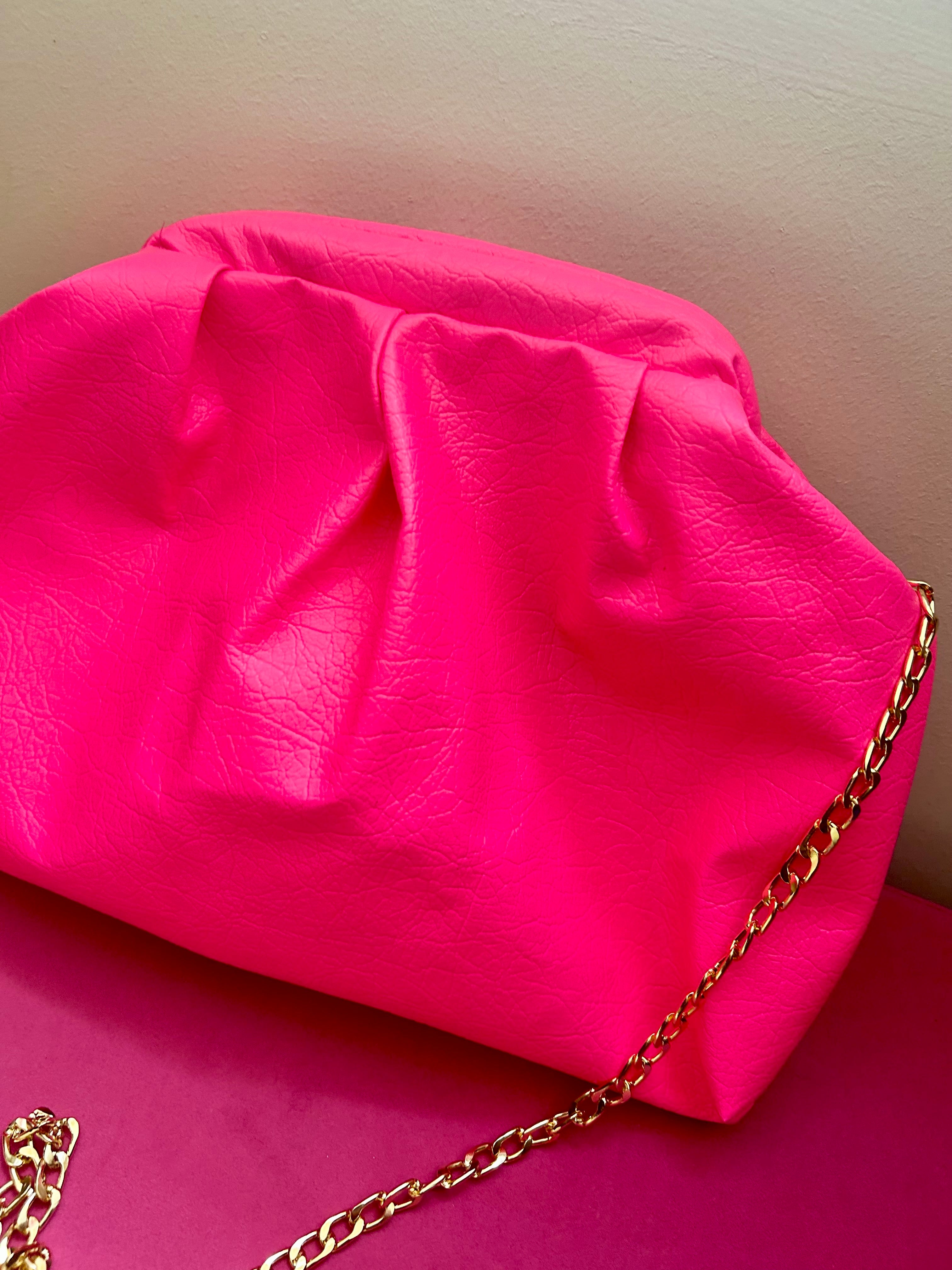 Neon pink dumpling bag
