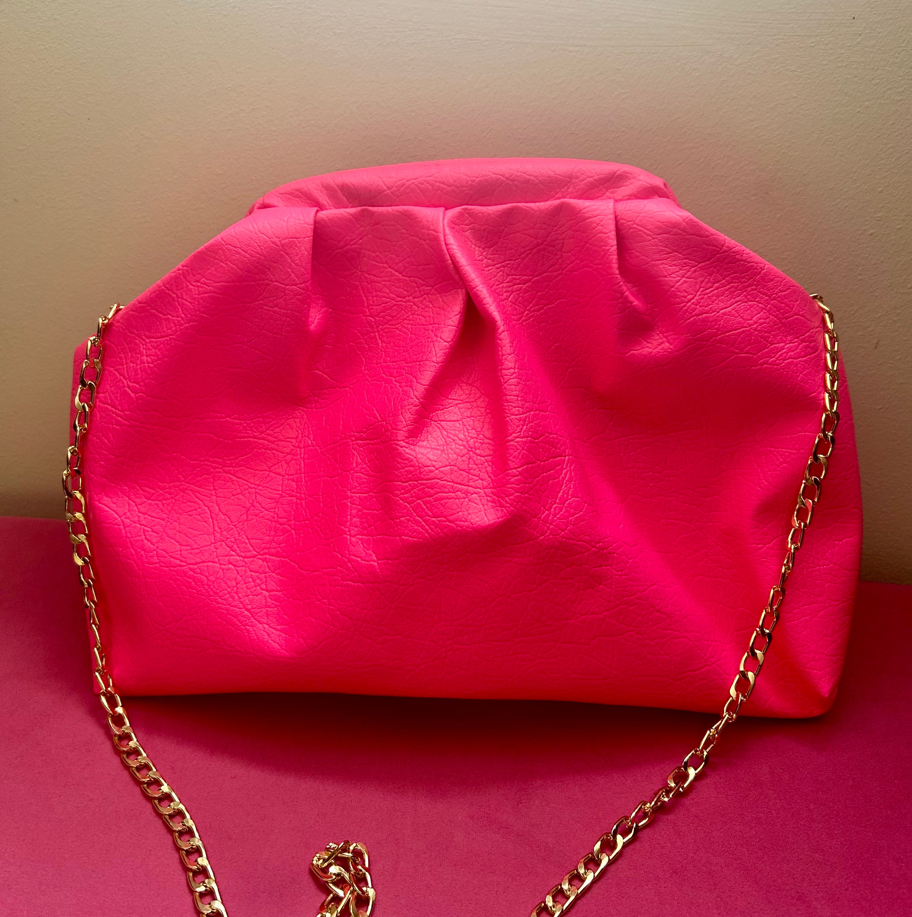 Neon pink dumpling bag